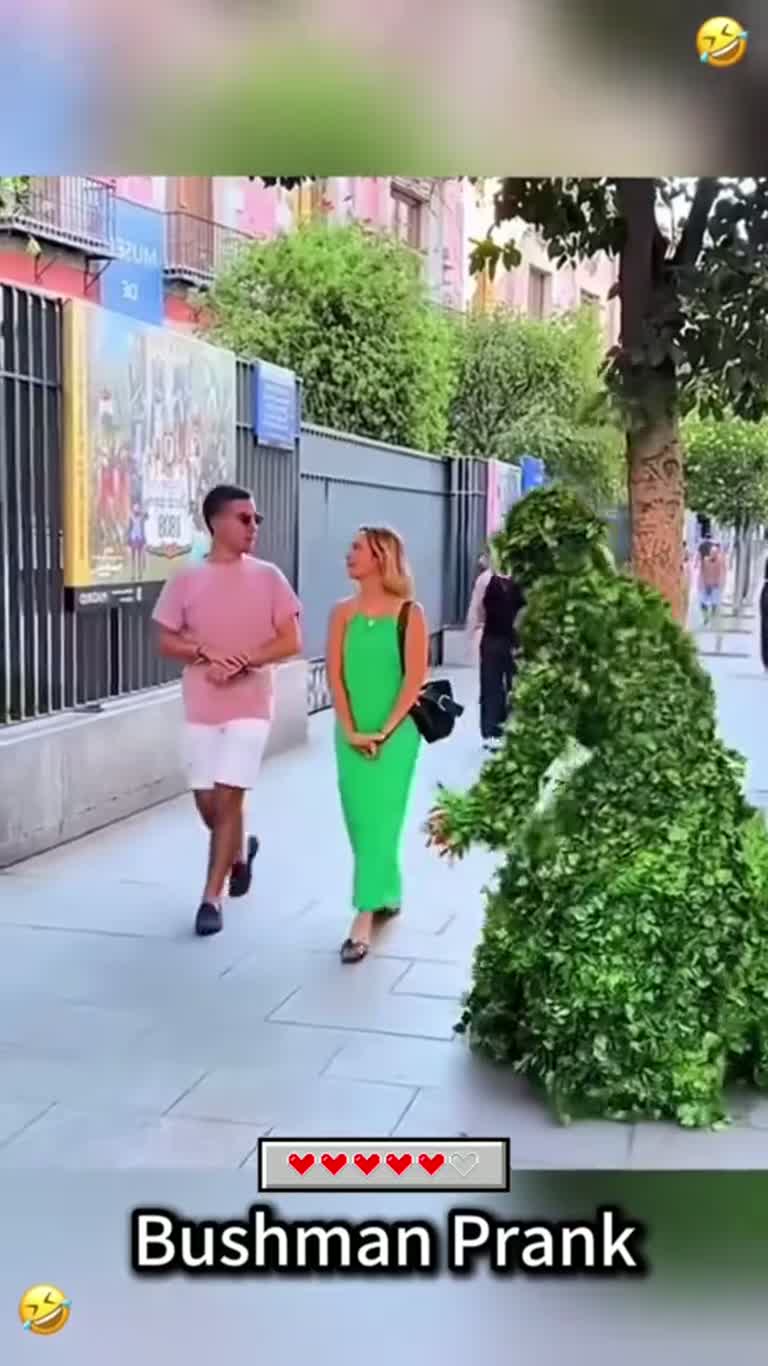 Bushman Prank: Hidden Person Scares Sidewalk Pedestrians