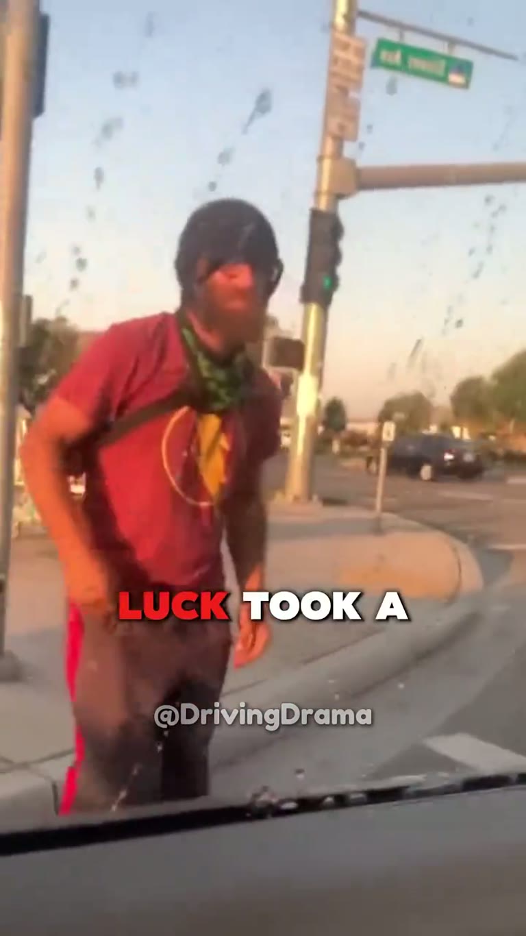 Man Kicks Car at Intersection, Then an Officer Steps In