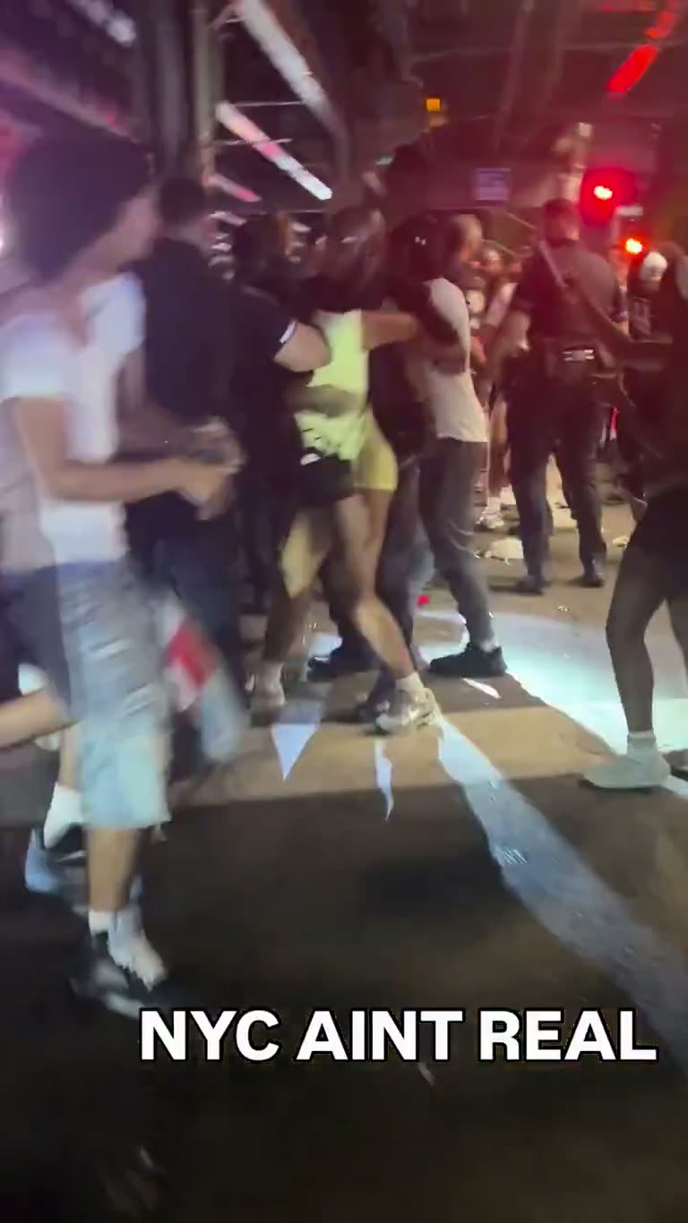 NYC Night Crowd, Officers and a Caption Asking for Chanel