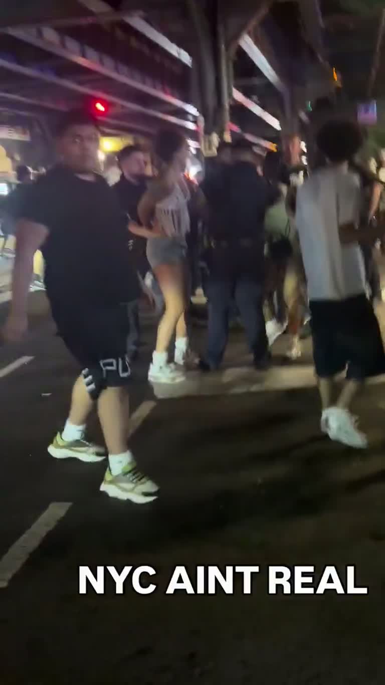 NYC Night Crowd, Officers and a Caption Asking for Chanel