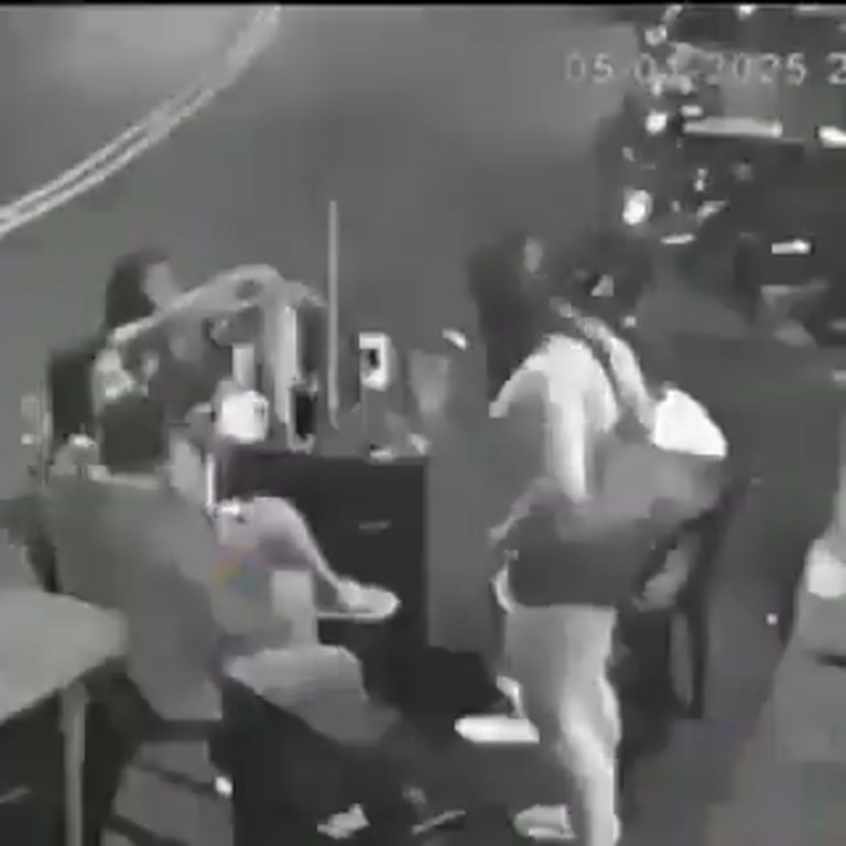 Drinks by the Roadside at Night: CCTV Captures a Sudden Turn