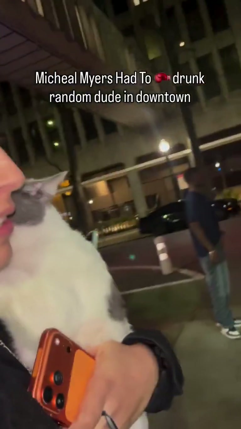 Downtown clip: man with cat attacked, fight ends on the pavement