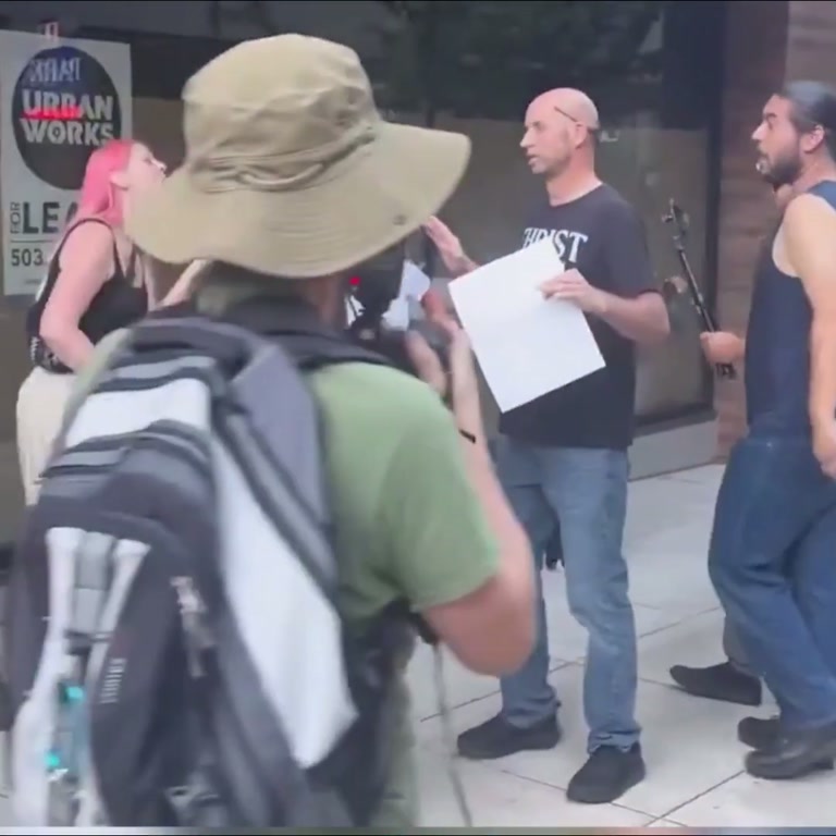 Video Shows Protest Confrontation Ending With Woman on Ground