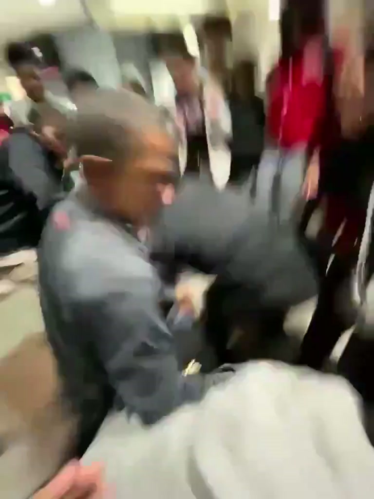 Cafeteria Confrontation: One-Sided Fight Caught on Camera