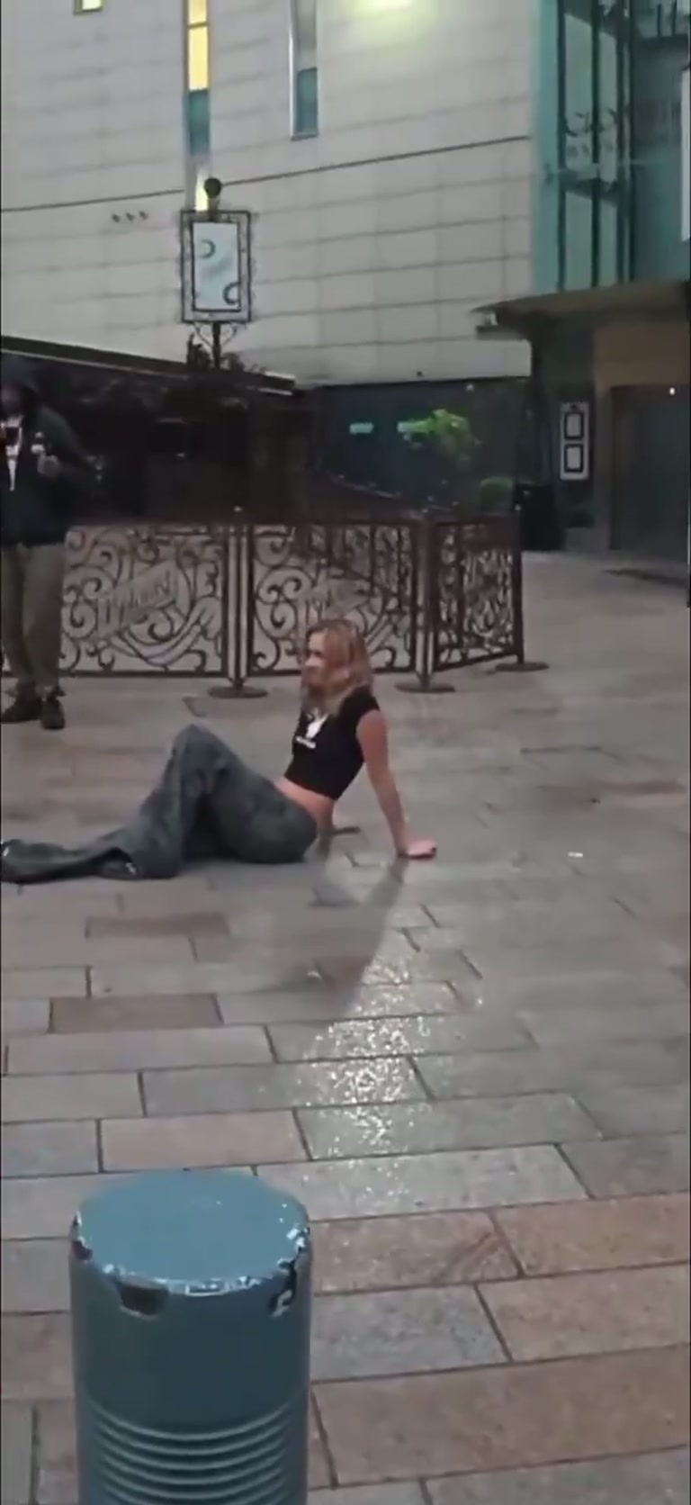 A punch from behind on a night street, then the crowd turns