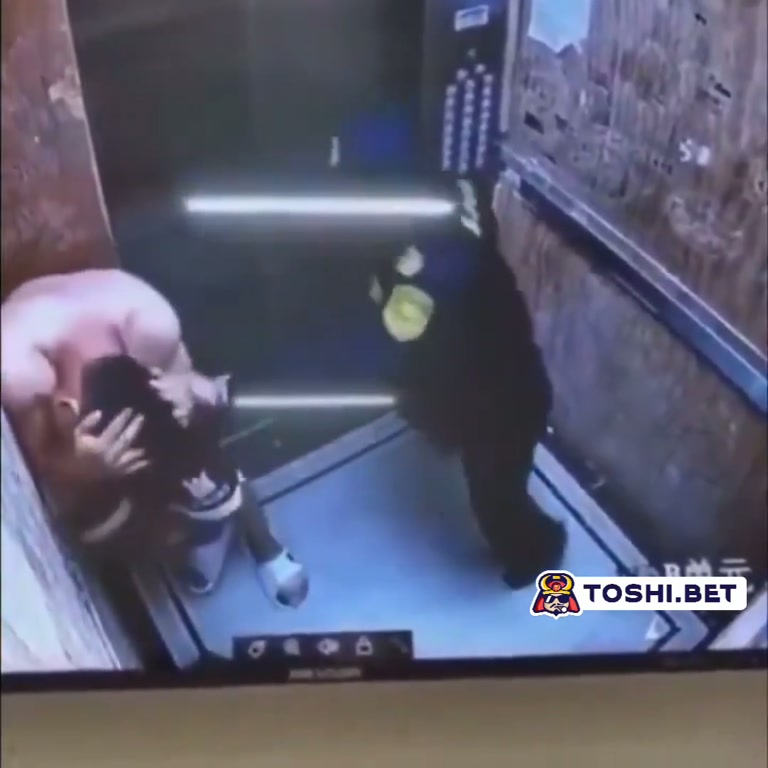 Elevator Attack: Uniformed Guard Steps In as Woman Is Cornered