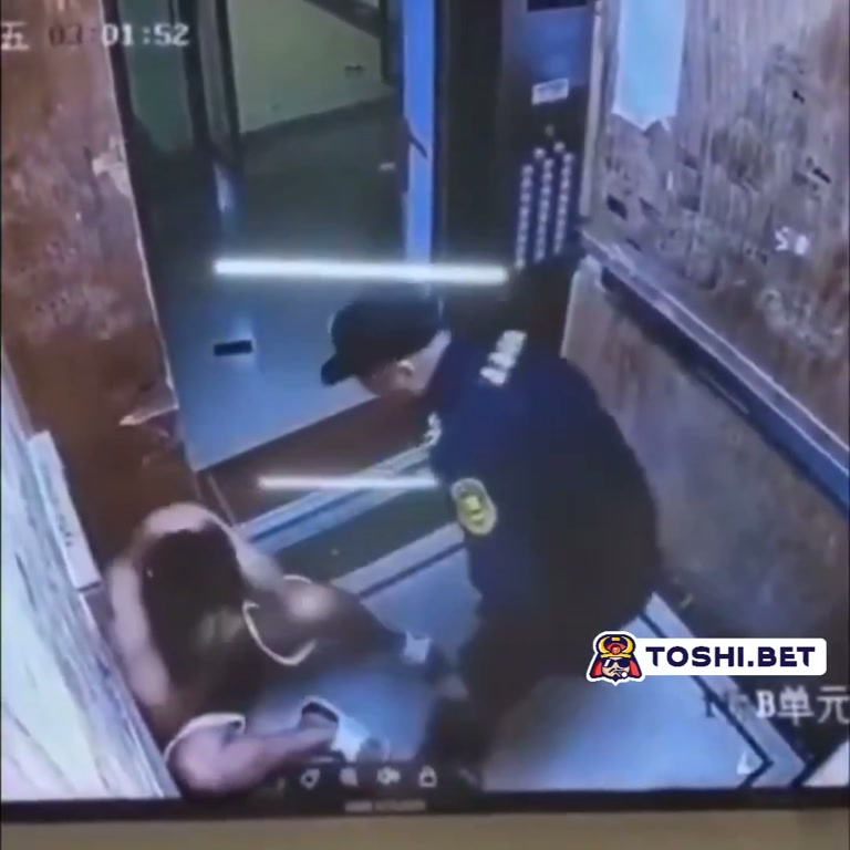 Elevator Attack: Uniformed Guard Steps In as Woman Is Cornered