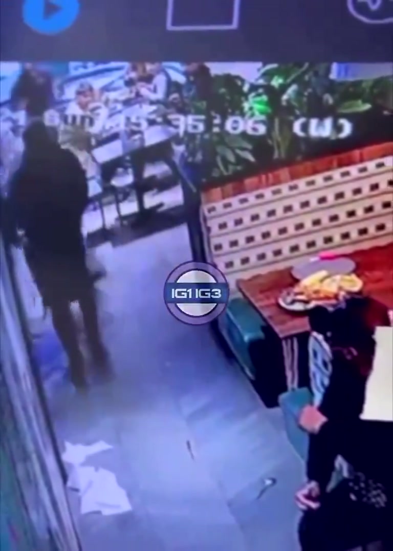 Restaurant Camera Records a Moment the Caption Calls 'Beyond Evil'