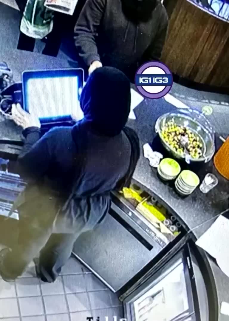 Restaurant Camera Records a Moment the Caption Calls 'Beyond Evil'