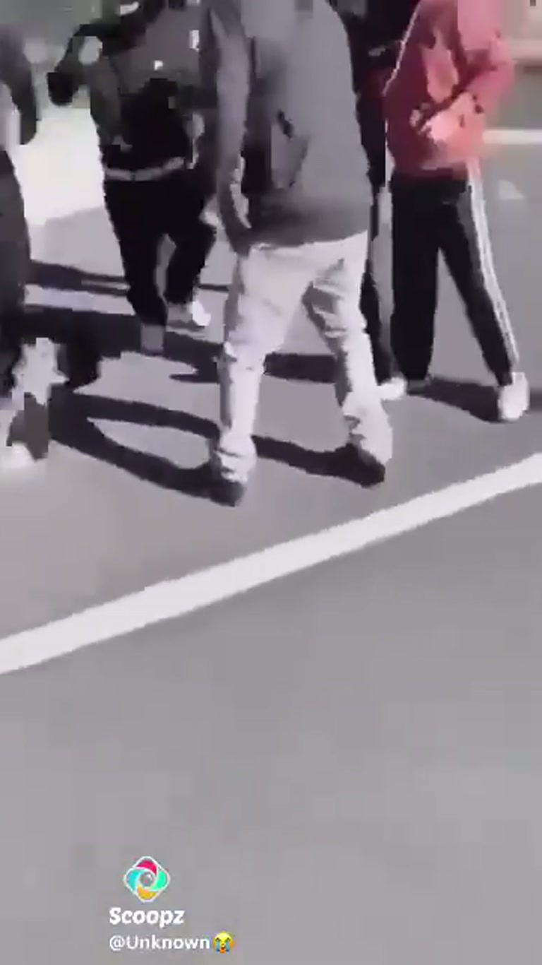 Parked SUV, a Group in Hoodies, and a Sudden Turn on a Quiet Street