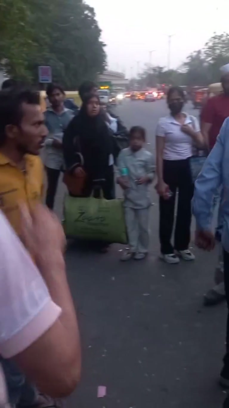 Bus Door Confrontation Spills Onto the Street as Police Arrive