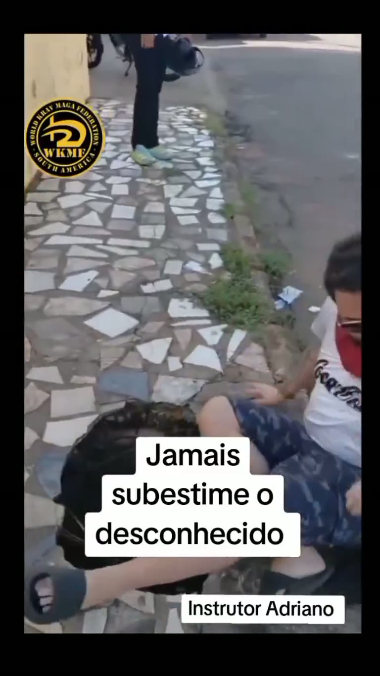 A Street Challenge Ends With One Man Held on the Ground