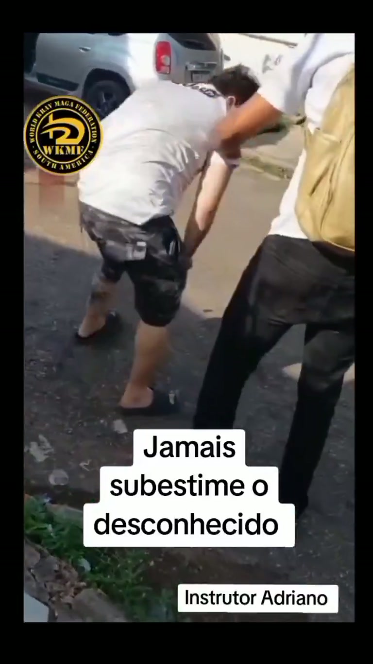 A Street Challenge Ends With One Man Held on the Ground