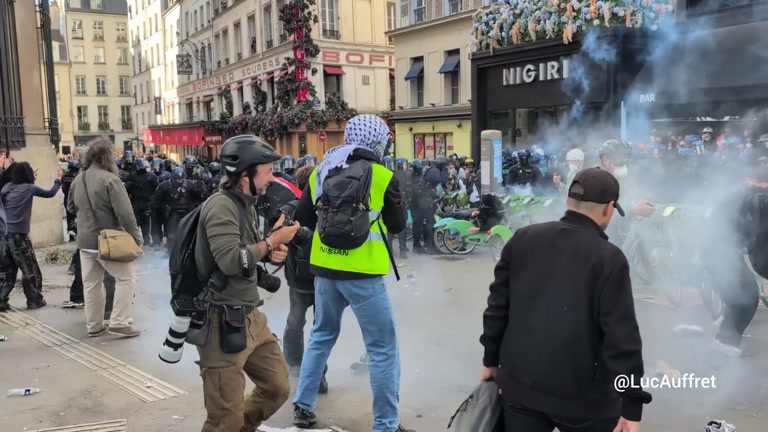 Smoke and Running Crowds Fill a French Street in New Video