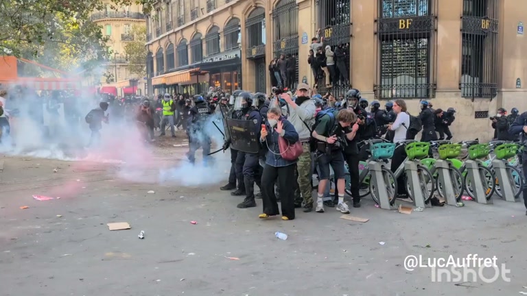 One Ordinary Afternoon, Then Pink Smoke Rolls Down the Boulevard