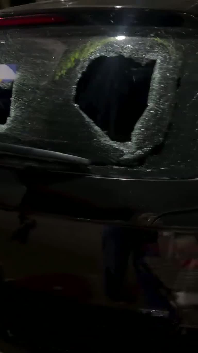 A Single Sticker, a Smashed Window, and a Mother's Camera
