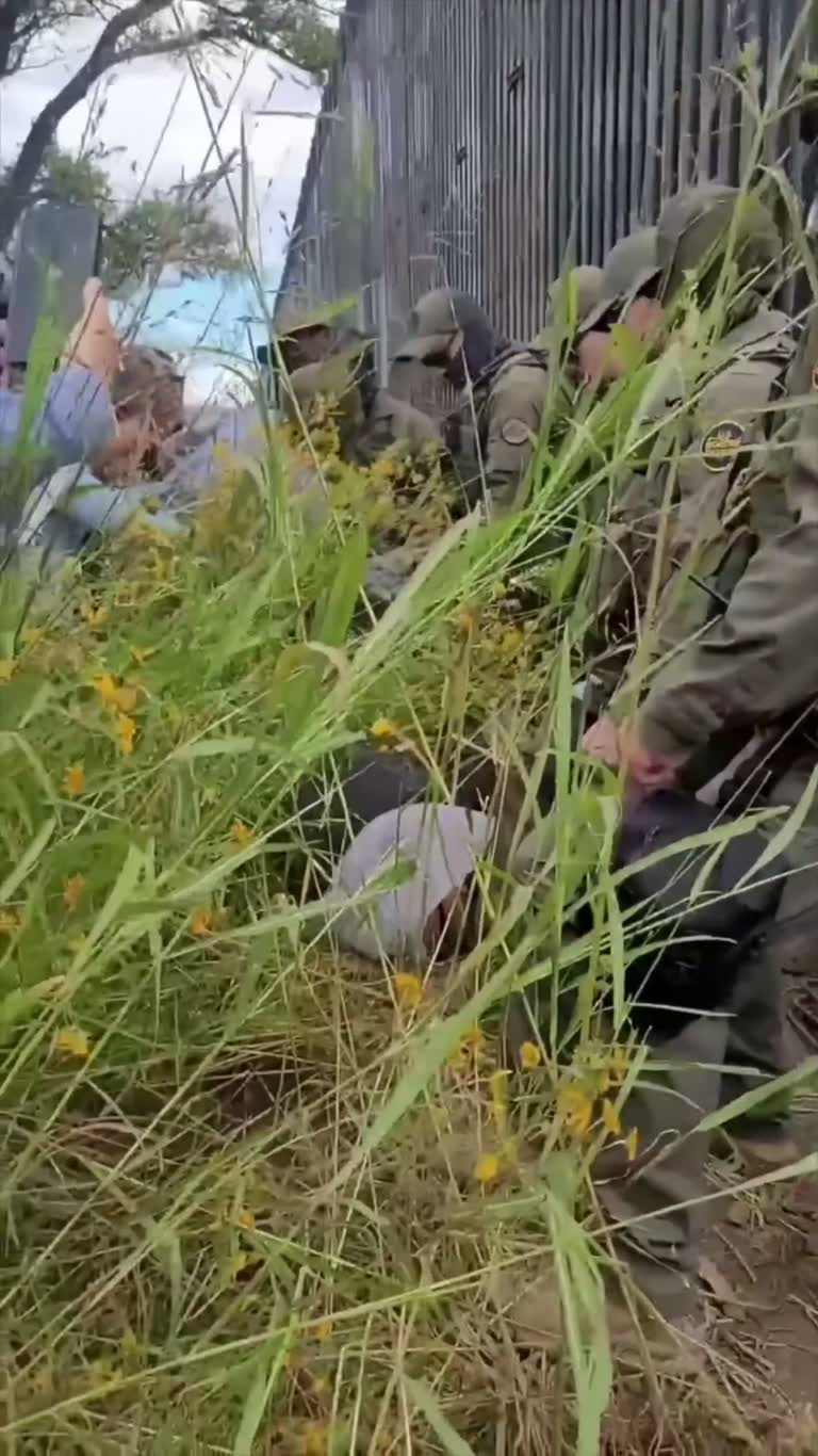 They Lay Down in the Grass to Stop a Steel Wall From Rising