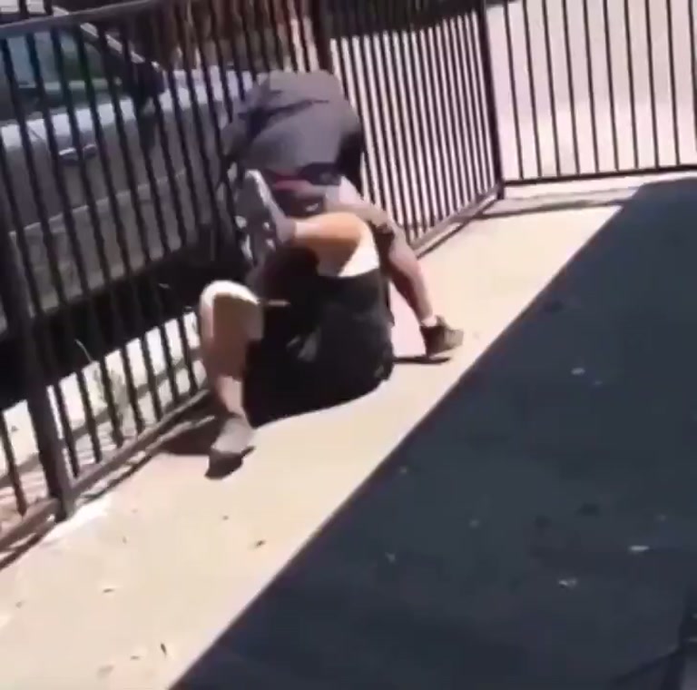 Beside a Black Fence, a Split-Second Choice Flips the Entire Fight