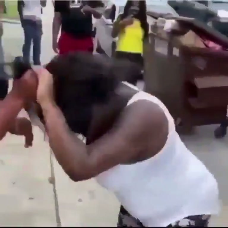 A Sunny Sidewalk, Two Women, and a Fight Nobody Stopped