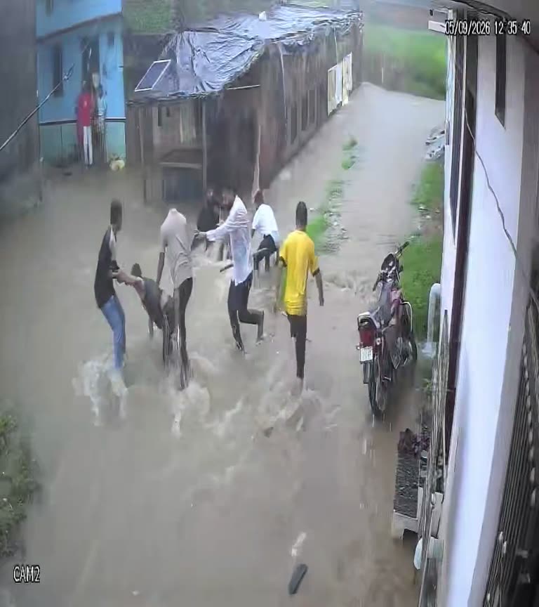 One Hidden Grate, One Second: A Boy Vanishes in Floodwater