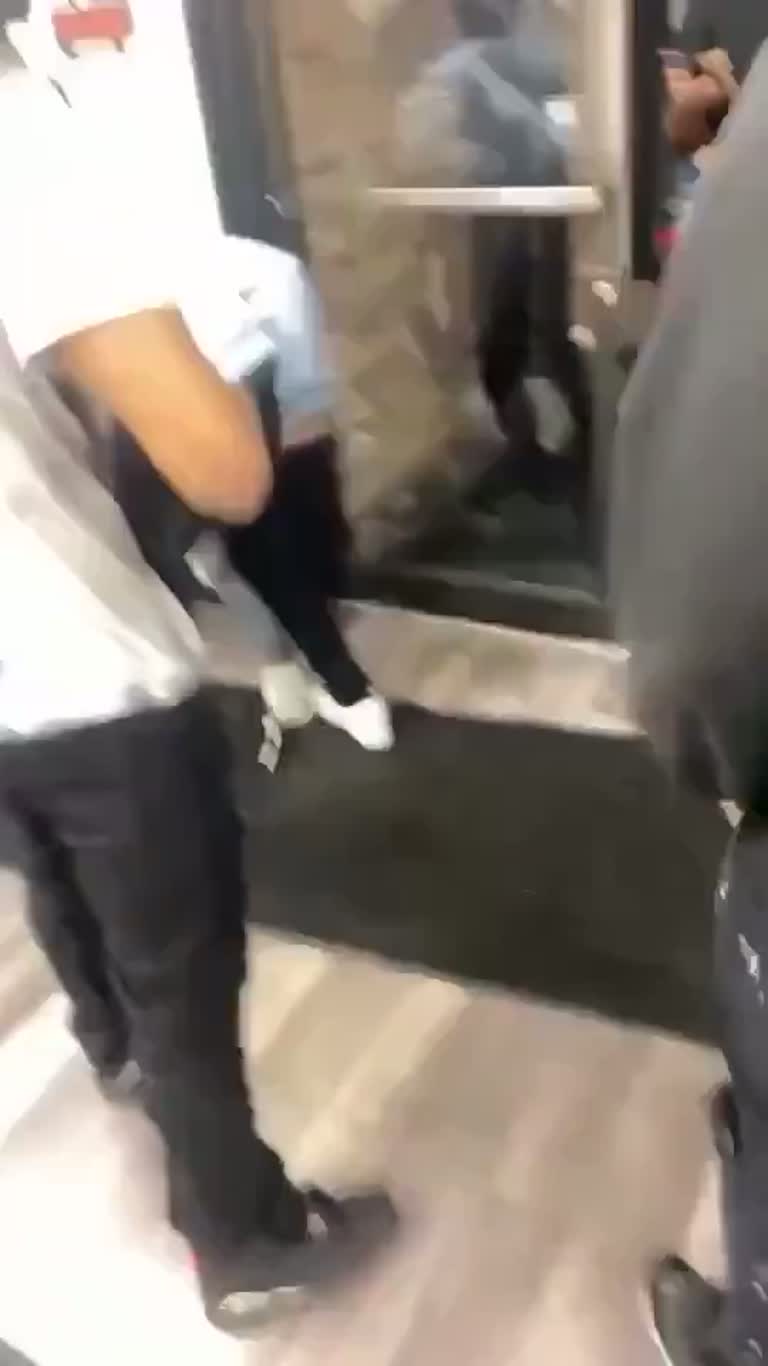 A Store, a Crowd, and One Friend Who Steps Into the Middle