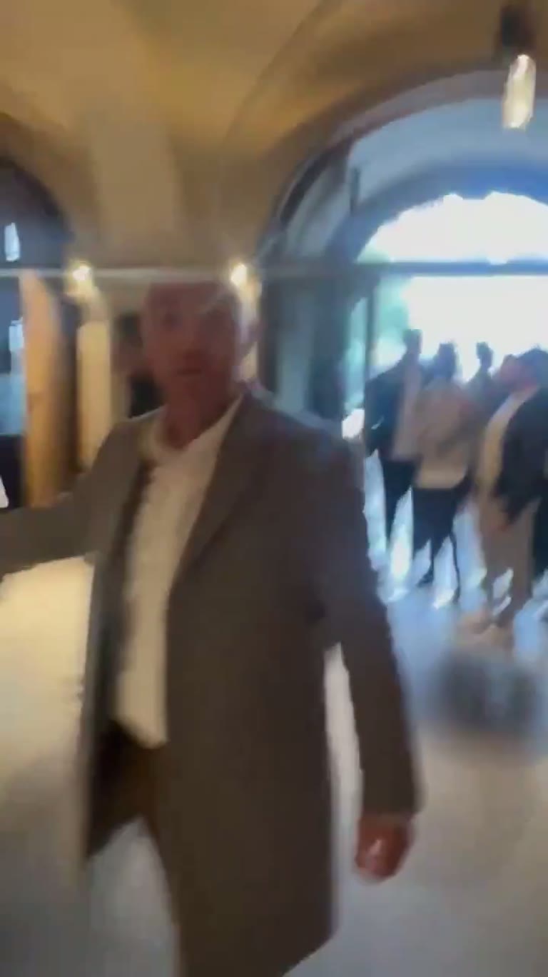A Calm Hallway, One Grin, and a Scene That Turns in Seconds