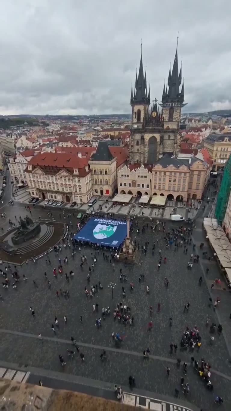 A Square, a Giant Banner, and a City Holding Its Breath