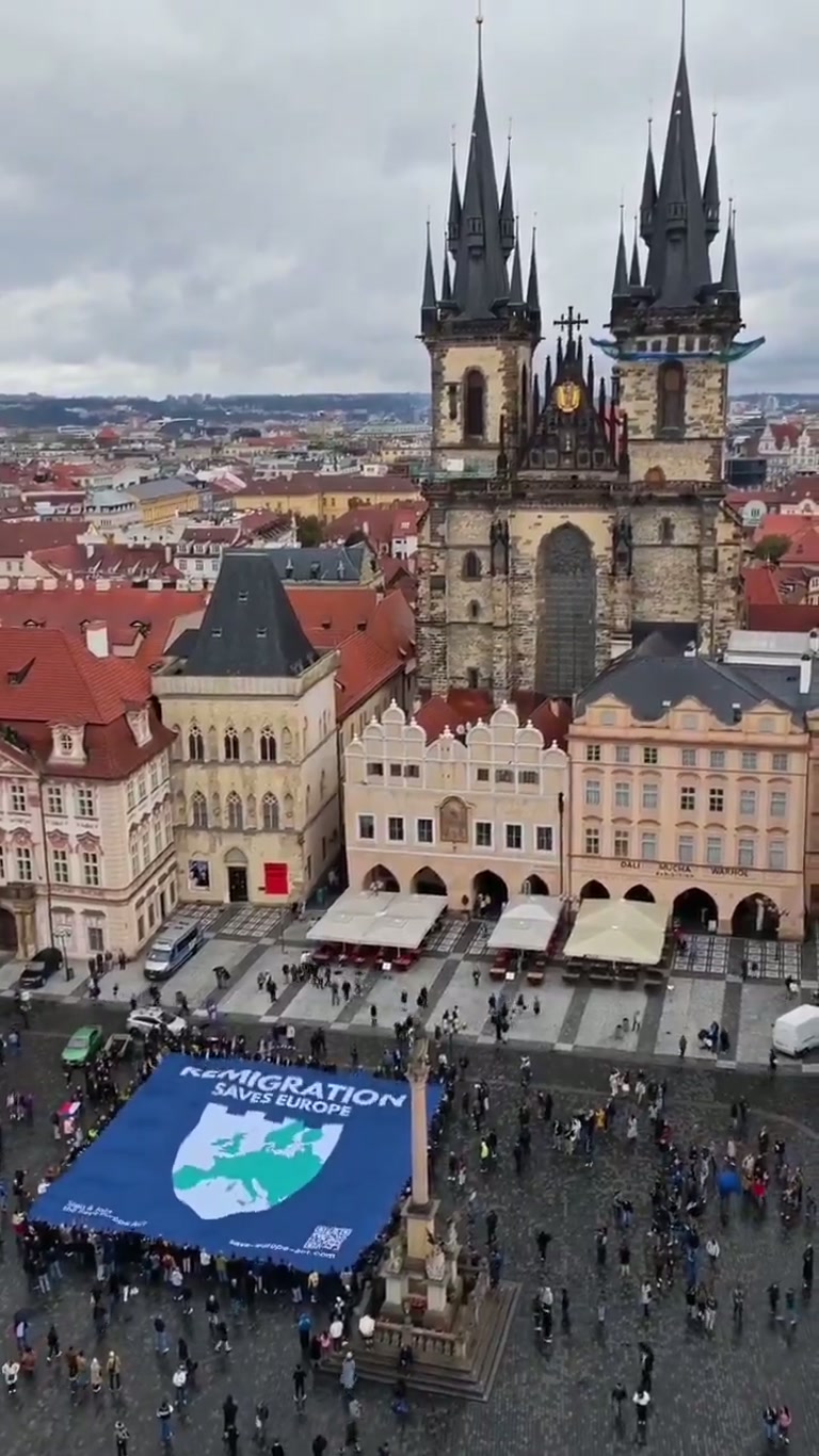 A Square, a Giant Banner, and a City Holding Its Breath