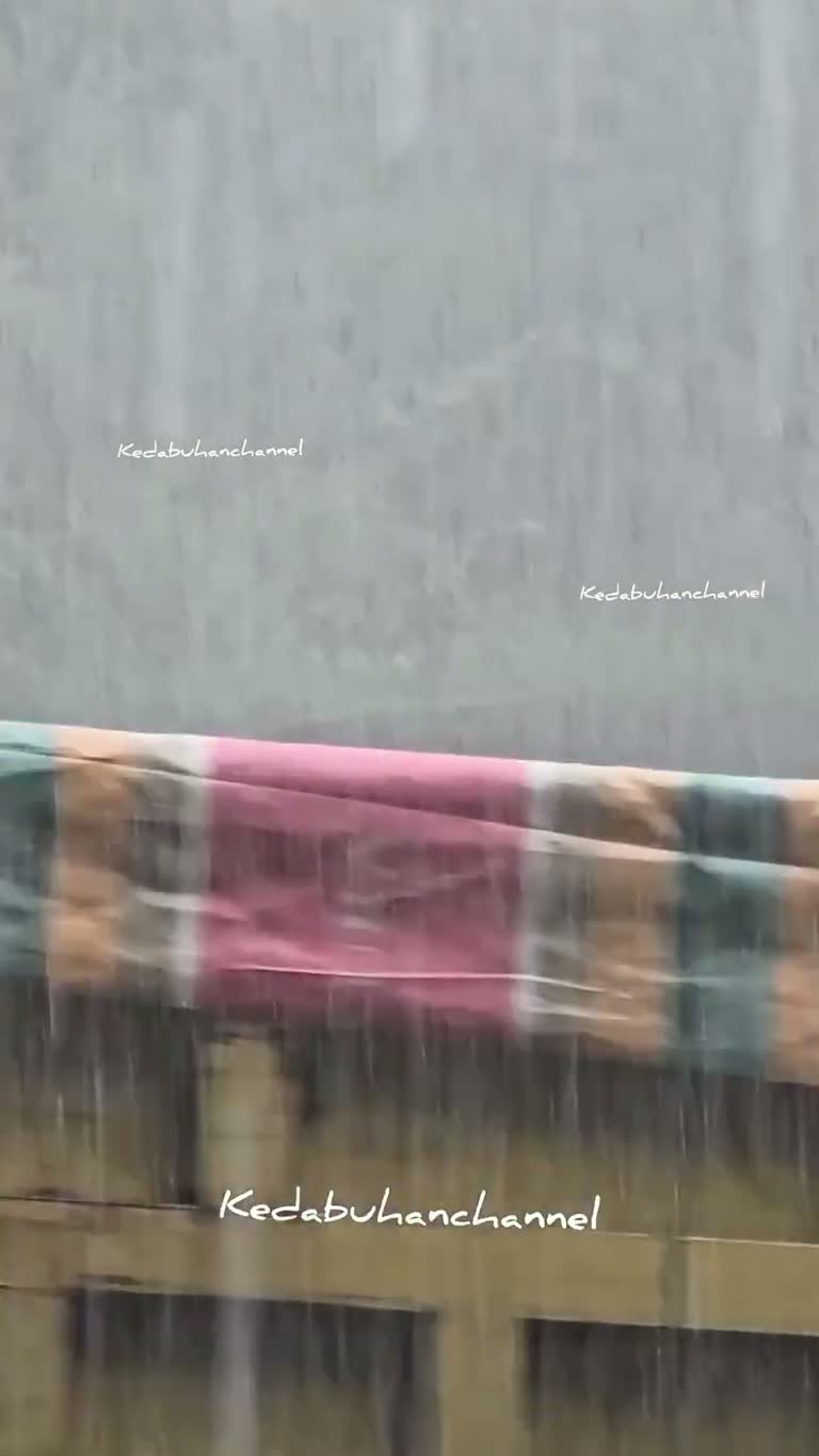 A Man Runs for His Life as a Wall of Water Swallows the Street
