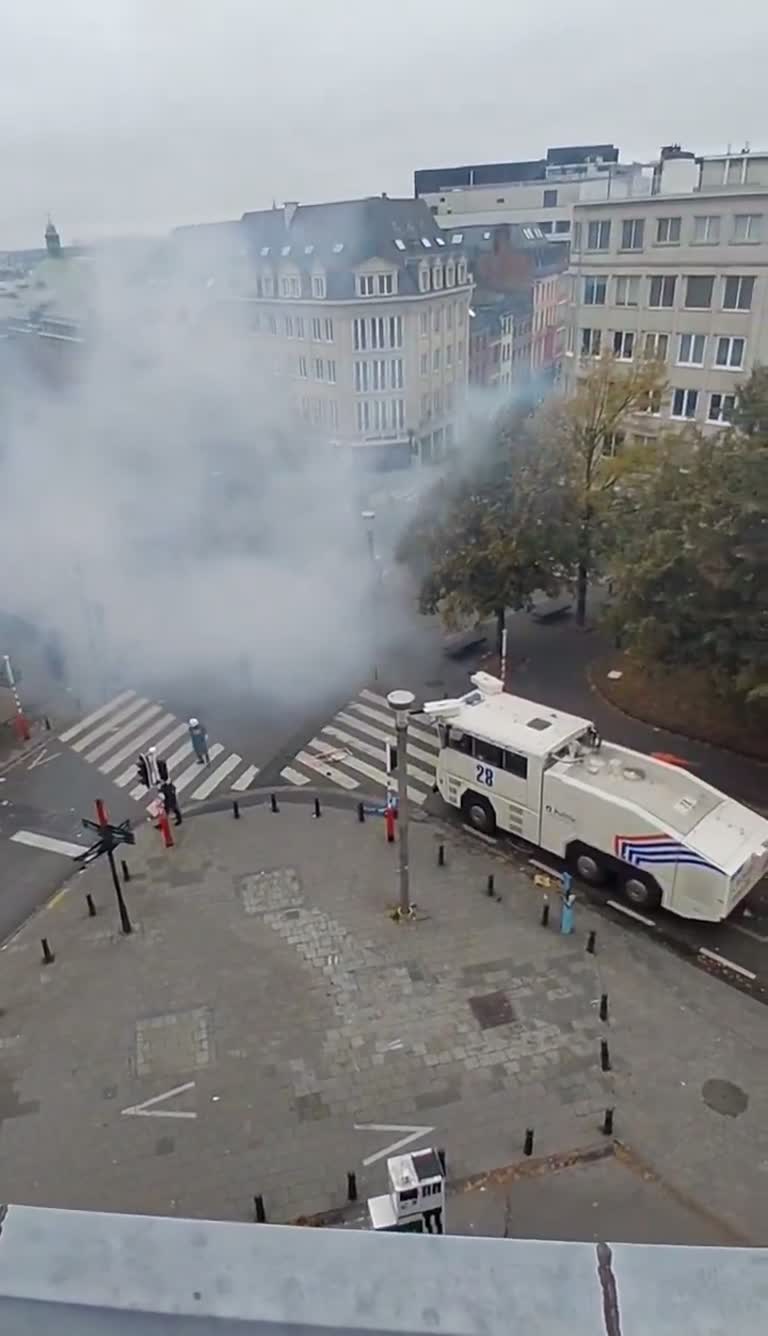 Brussels Street Fills With Tear Gas as Water Cannon Moves In