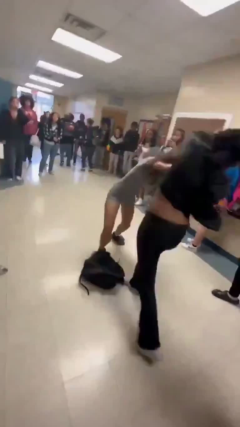 A Hallway Crowd, One Backpack, and a School Fight Caught on Camera