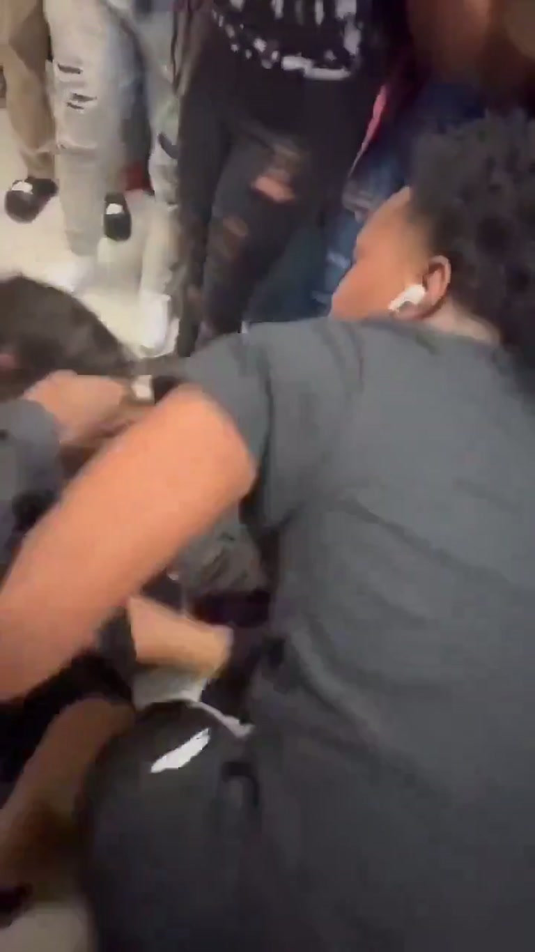 A Hallway Crowd, One Backpack, and a School Fight Caught on Camera