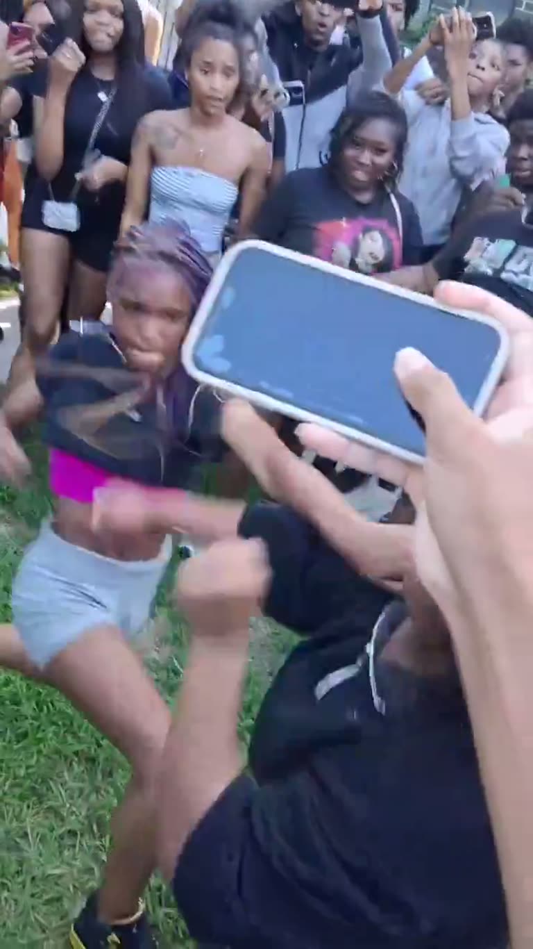 Chaos on the Lawn: A Crowd, a Clash, and One Unbothered Cameraman