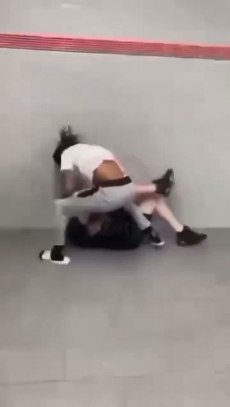 Caught Off Guard: Sudden Confrontation in a Quiet Hallway