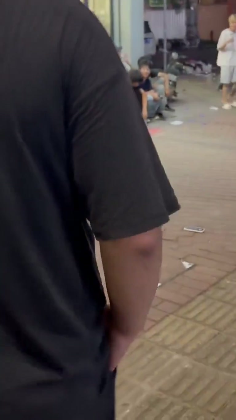 Late-Night Clash Outside Store Draws Onlookers