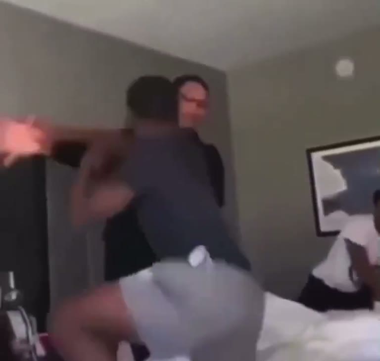 A Sudden Slap From Behind Ignites a Chaotic Room Scuffle