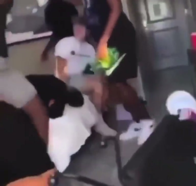 A Sudden Slap From Behind Ignites a Chaotic Room Scuffle