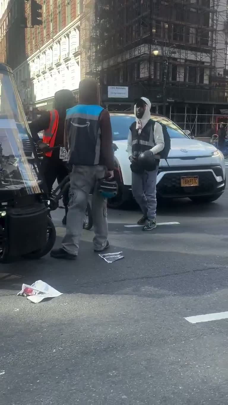 Helmet Clash in Busy NYC Street Caught on Video