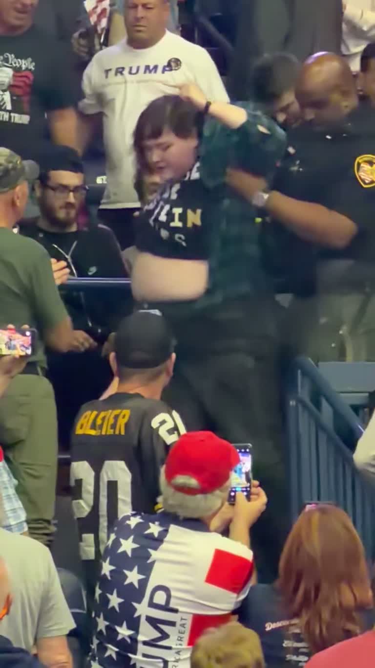Woman in "Release the Pistein" Shirt Removed from Arena Seating