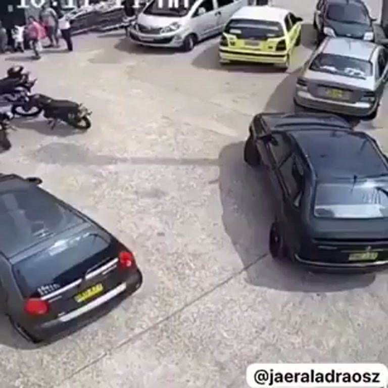 Moment fleeing suspect is stopped by flying kick in car park