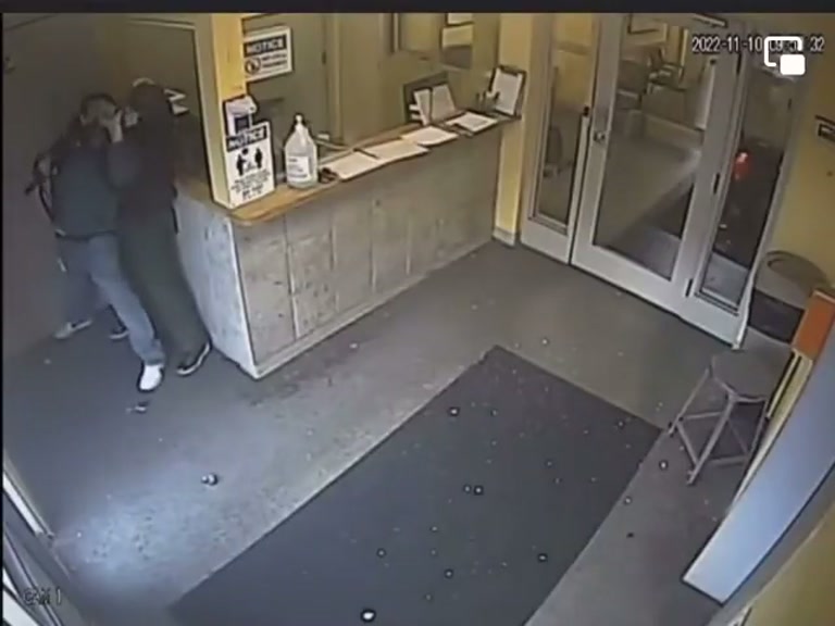 Moment Two Figures Clash at a Quiet Service Counter