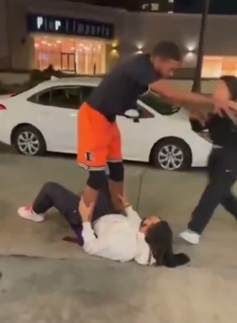Chaos on the pavement as a confrontation outside a home is caught on camera