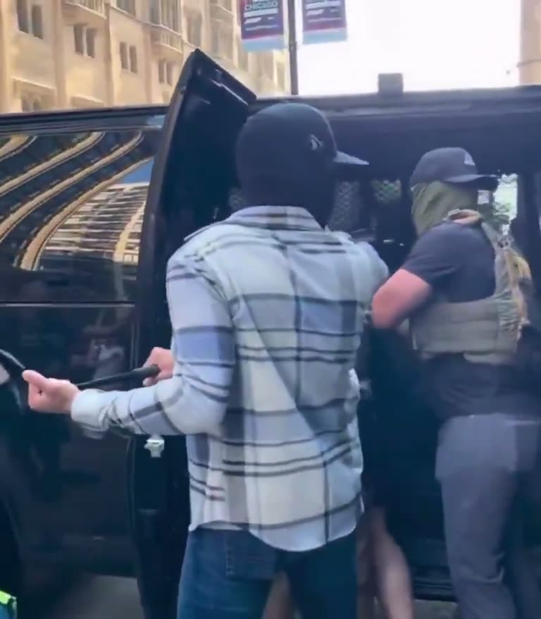 Masked ICE Agents Shove Suspect Into Van In Chicago Street