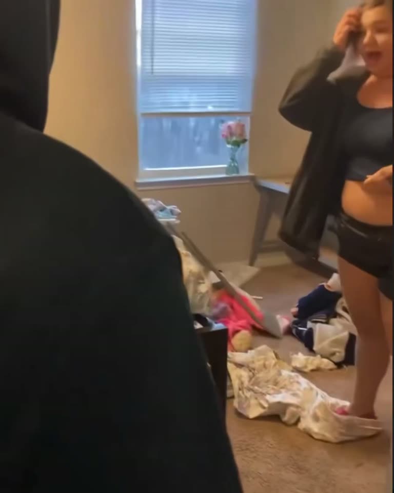 Chaotic scenes as argument spirals inside a residential property