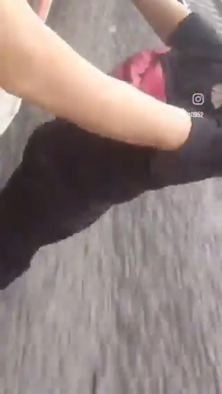 Moment woman loses balance on moving train in dramatic platform fall