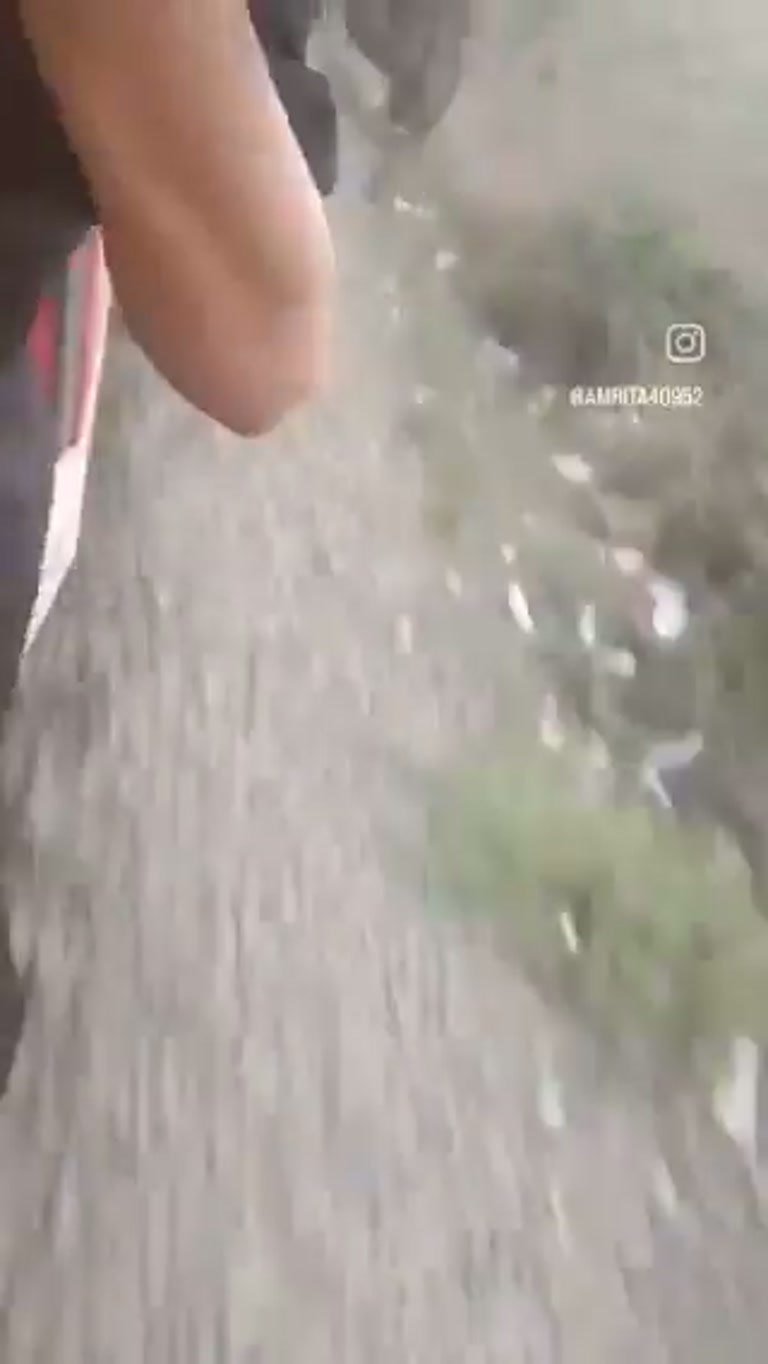Moment woman loses balance on moving train in dramatic platform fall