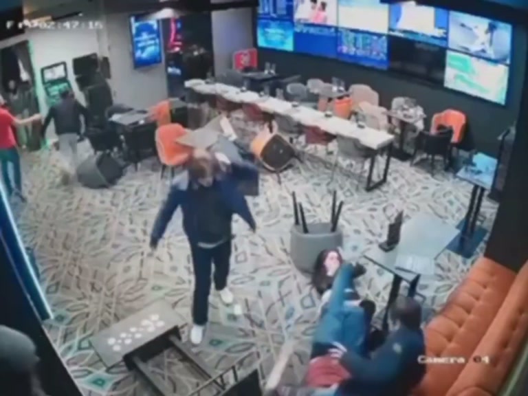Chaos Erupts in Quiet Sports Bar as Scuffle Shatters the Calm