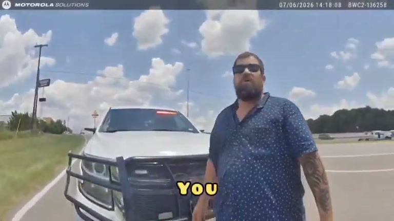 Truck driver's baffling roadside stop caught on camera