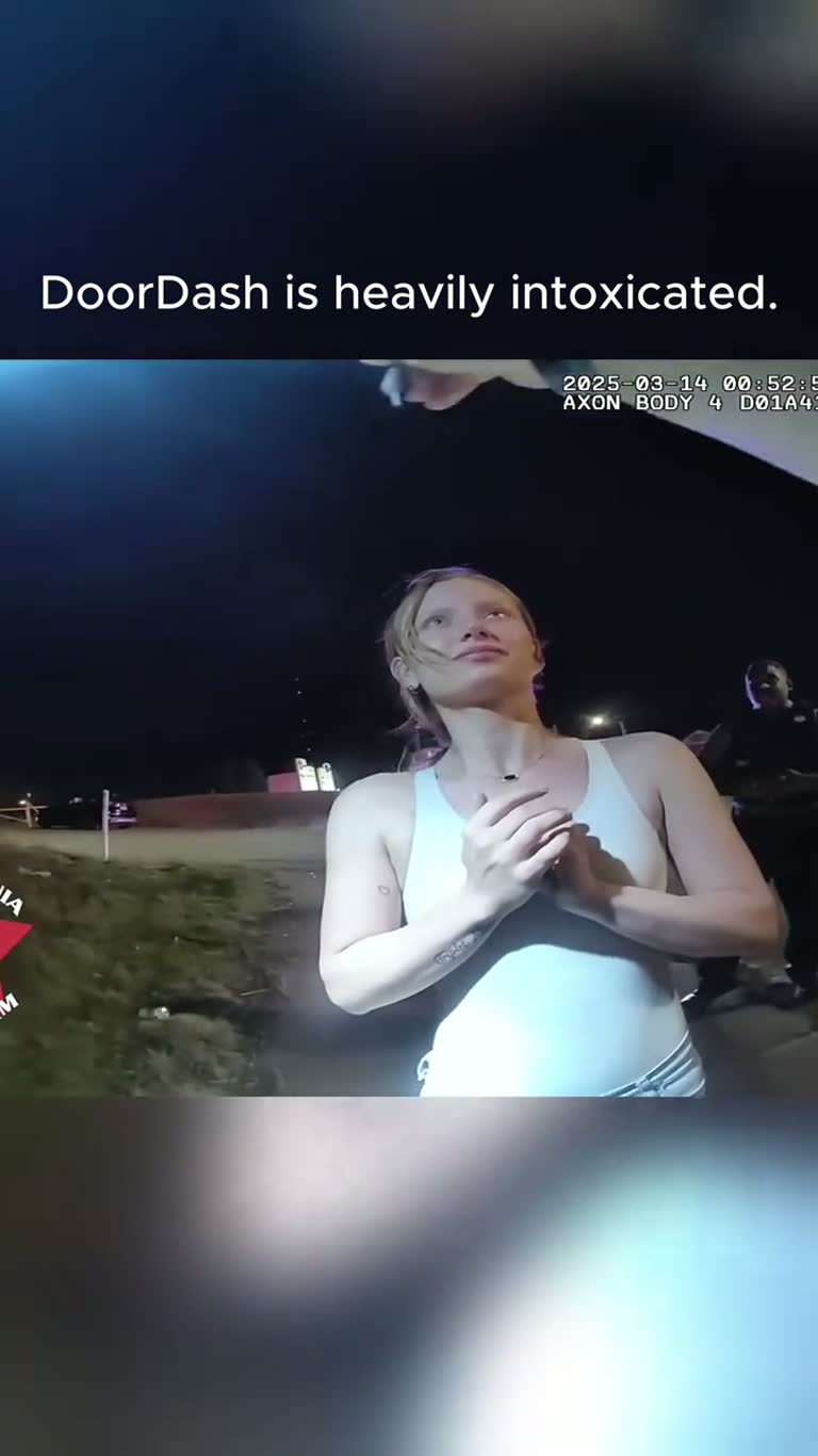 Woman in White Tank Top Sways on Roadside During Stop