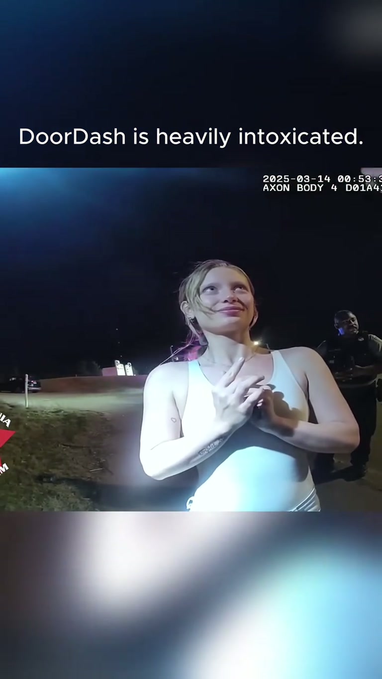 Woman in White Tank Top Sways on Roadside During Stop